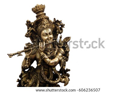 Metallic Idol of Hindu God Sri Krishna for sale to keep at home and offer puja or prayers                               