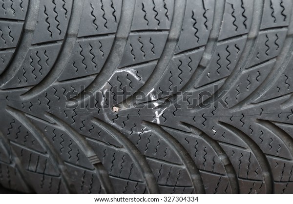 metallic nail in
damaged tyre before
repair
