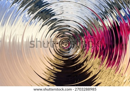 Metallic ripple vortex with concentric rings and radial motion — hypnotic circular abstract background.