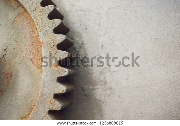 Metallic\
Rusty industrial machine parts closeup\
photo.