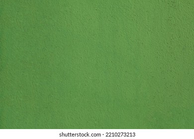 Metallic Wall Background, Texture. Green Or Dark-green Smooth Painted With Enamel Paint Surface. The Wall And Fence Sketches. Dark, Dingy And Faded Backdrop Of Shabby And Dirty Surface