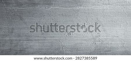 Metallic wall background, texture. Grey or dark-gray roughly painted surface. Old and faded wall and fence sketches. Dark, dingy and gloomy colors. Careless and poor painting