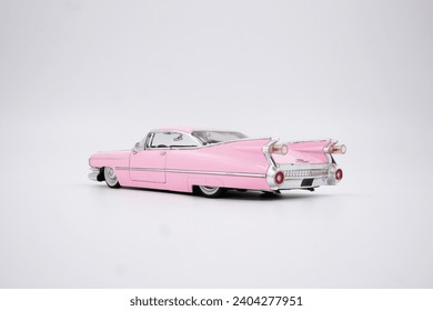 Metallic warm pink restored vintage car  - Powered by Shutterstock