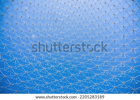 Metallic white sphere structure of a building in the sky