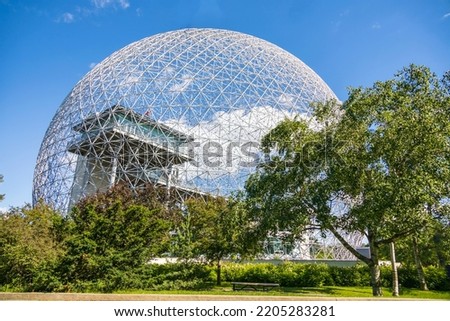 Metallic white sphere structure of a building in the sky