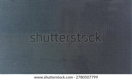 Metallic wire mesh screen creating a textured, symmetrical grid pattern, ideal for backgrounds