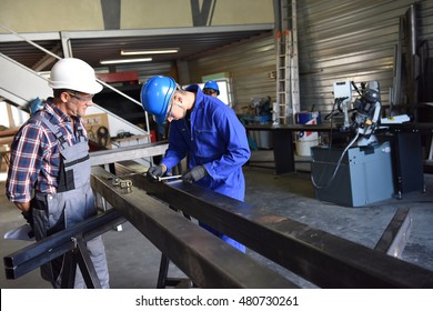 Metalwork student training in workshop - Powered by Shutterstock