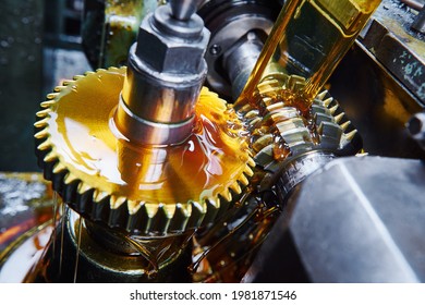 metalworking gear wheel machining with oil lubrication - Shutterstock ID 1981871546