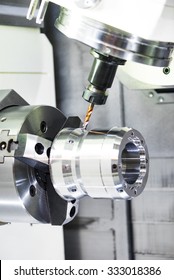 metalworking industry. drilling a hole on modern metal working machining center