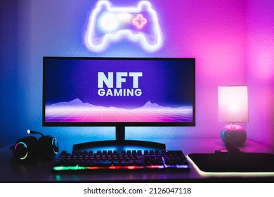 Metaverse and Blockchain Technology Concept - Gaming room displaying NFT marketplace on computer screen - Focus on monitor