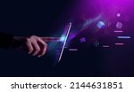 Metaverse and Blockchain Technology Concepts. Person with an Experiences of Metaverse Virtual World via Smart Phone. Futuristic Tone. Conceptual Photo