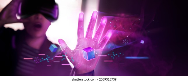 Metaverse and Blockchain Technology Concepts. Person Enjoying an Experiences of Metaverse Virtual World. Futuristic Tone - Shutterstock ID 2059315739