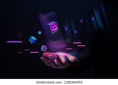 Metaverse and Blockchain Technology Concepts. Person with an Experiences of Metaverse Virtual World via Smart Phone. Futuristic Tone. Hand Levitating Mobile Phone - Shutterstock ID 2185344593