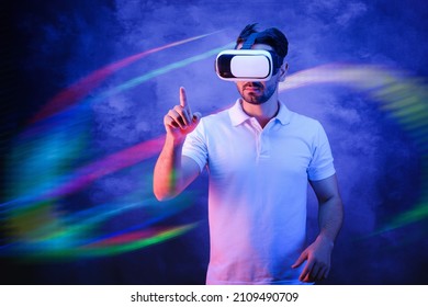 Metaverse Concept. Caucasian Man Wearing Vr Glass Travel In Virtual Reality World In Cyberspace