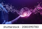 Metaverse Technology.Next generation technology.Global networking connection,science, innovation and communication technology.Hand holding earth globe with data exchanges on connection technology.