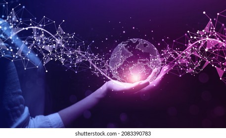 Metaverse Technology.Next generation technology.Global networking connection,science, innovation and communication technology.Hand holding earth globe with data exchanges on connection technology. - Shutterstock ID 2083390783
