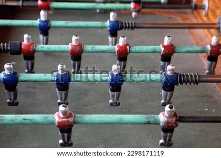 Similar – Image, Stock Photo Metal old foosball table with yellow and blue figurines