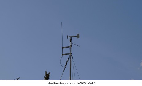 Meteorological Weather Vane Against Blue Sky