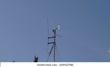 Meteorological Weather Vane Against Blue Sky