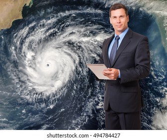 Meteorologist forecasting hurricane - Powered by Shutterstock