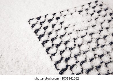 Meteorology, Forecasting And Winter Weather Season Concept - Door Mat On Snow Background.