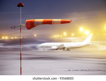 Meteorology Windsock Inflated By Wind In Airport At  Non-flying Night