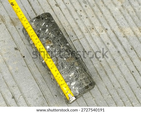 meter, which measures "coring." "Coring" is the process of drilling a hole to the exact size and desired depth. This method uses a water-lubricated system during the drilling process.