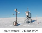 Meterological weather station, wind meter in front of Meadow Hut, krkonose mountains, winter morning. 