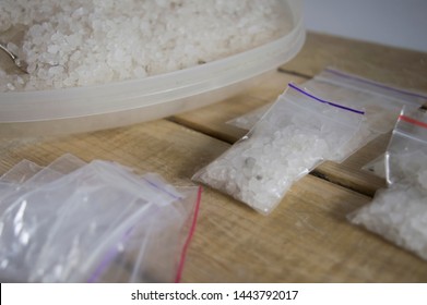 Methamphetamine. Meth. Bath Salts Drug. Flakka Or Alpha-PVP Drug. Drug Trafficking Concept. Illicit Substances. Designer Drugs. Drug Packaging On Wooden Table. 