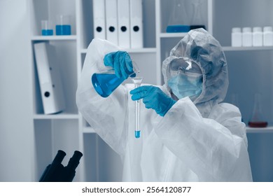 A meticulous scientist in protective gear is conducting a complex experiment in a hightech lab, using chemical elements and biological agents to advance our understanding of science and technology - Powered by Shutterstock