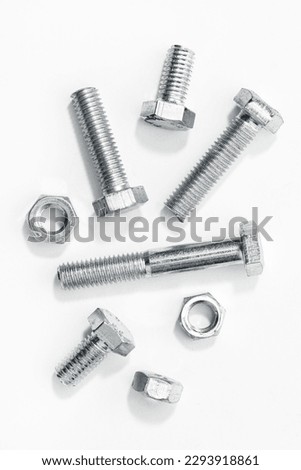Metric Bolts and nuts isolated on white background