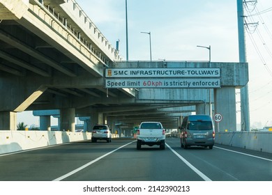 Metro Manila, Philippines - April 2022: A speed limit sign reminds motorists to keep below 60kph. At the northbound lane of Skyway.