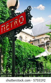 Metro Sign At Saint Germain De Pres Cathedral In Paris, France