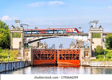 Metro Train In Moscow City On Bridge Over Moscow River Channel Dam Landmark. Side View Of Head Car Of Moscow Central Diameters MCD Rapid Metro System In Moscow City Russia On August 2020