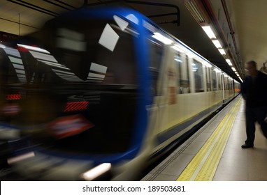 Metro train in motion in Madrid, Spain.