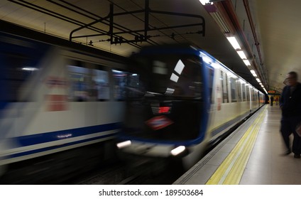 Metro train in motion in Madrid, Spain.