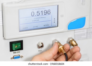 The Metrology And Standardization Laboratory Specialist Connects The Device Under Test Pressure Gauge To The Pressure Calibration And Verification Instrument. Checking The Pressure Value