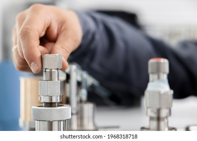 The Metrology And Standardization Laboratory Specialist Connects The Device Under Test Pressure Gauge To The Pressure Calibration And Verification Instrument. Checking International Quality Standards