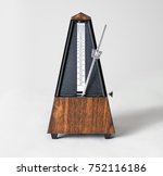 Metronome in action, closeup, isolated and on a plain background. Calgary, Alberta, Canada.