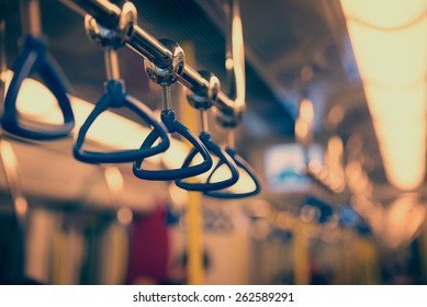 Metropolis. Handrails in a subway car in the photo instagram style. - Shutterstock ID 262589291