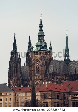 The Metropolitan Cathedral of Saints Vitus, Wenceslaus and Adalbert - Roman Catholic cathedral in Prague, outside view. St. Vitus Cathedral, Medieval gothic architecture of the Prague Castle complex.