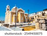 The Metropolitan Church of Ypapanti in Kalamata, Greece, a grand neoclassical Orthodox church with domes and historic significance.