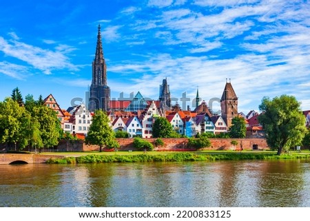 Metzgerturm Tower, Ulm Minster Church or Ulmer Munster Cathedral and Danube river in Ulm old town. Ulm Minster Church is currently the tallest church in the world.