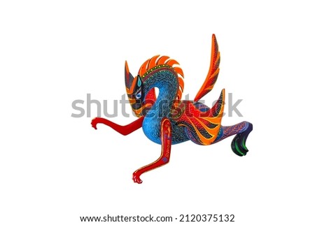 Mexican Alebrije, a colorful and beautiful craft handmade. Animal wood sculpture 