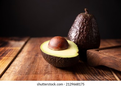 Mexican Avocado (persea Americana) On Rustic Wooden Table. Main Ingredient To Prepare Guacamole. Close Up Image