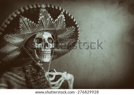 Mexican Bandit Skeleton 7. A skeleton wearing a Mexican sombrero and a poncho. Edited in a vintage film style.