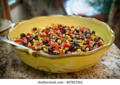 Mexican Bean And Corn Salad Salsa In Giant Yellow Bowl