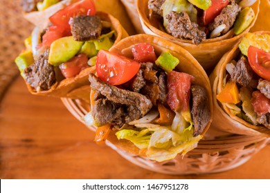 Mexican Beef Salad In Corn Taco Tortilla Cones. Top View