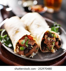 Mexican Beef Steak Burritos With Black Beans, Rice, And Salsa