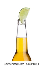 Mexican Beer Bottle With Lime Slice And Frost On White Background